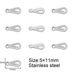 Macro detail of 5x11mm stainless steel water drop charms with 18KGP engraving