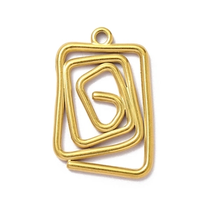 Macro shot of gold-plated stainless steel geometric spiral pendant with mounting ring