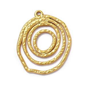 Macro detail of golden circular pendant with handmade spiral hammered texture and ring loop