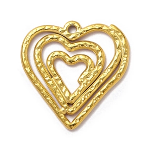 Detailed view of triple-layered golden heart pendant with unique hammered metal texture