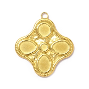 Detailed view of gold plated stainless steel floral pendant with hammered texture edges