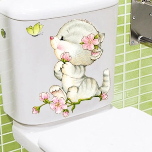 Watercolor kitten and cherry blossom wall sticker applied on white bathroom surface