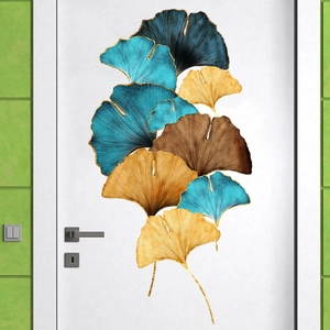 Nordic ginkgo leaf wall decals in teal and gold for modern living room decor