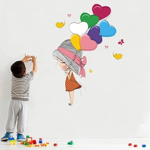 DIY wall decal featuring a girl with heart balloons, birds and butterflies for kids room