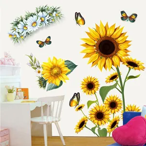 Macro detail of sunflower and butterfly wall decals decorating a white home office desk area