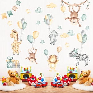 Detailed view of watercolor safari animals wall stickers in a cozy nursery playroom setting