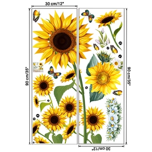 Detail view of sunflower and butterfly wall stickers with size labels and layout guide