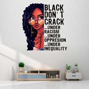 Modern wall sticker featuring black woman illustration and typography in a minimalist room