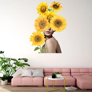 Artistic wall sticker featuring large sunflowers over a female silhouette in a living room