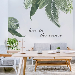 Tropical monstera and palm leaves wall decals with love in the corner text for home decor