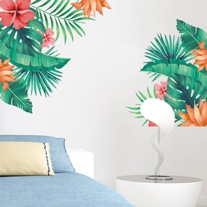 Tropical wall stickers featuring palm leaves and red flowers in a modern bedroom setting
