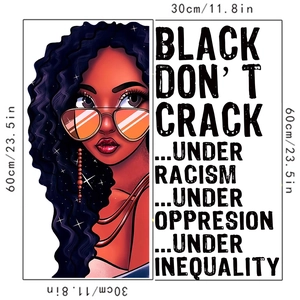Detail of wall decal showing a Black woman with purple hair and social justice slogan