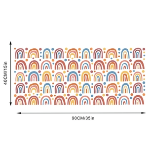 Detail showing 90x40cm dimension of rainbow and polka dot wall sticker in Nordic style