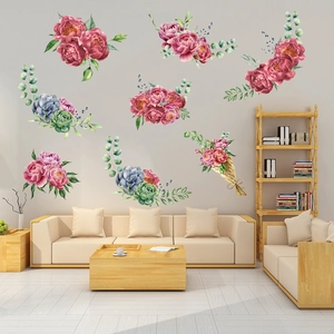 Detail of pink peony and succulent wall stickers with watercolor design on a living room wall