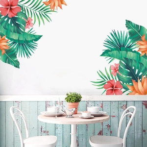Tropical wall stickers with red hibiscus flowers and green leaves in a dining room scene