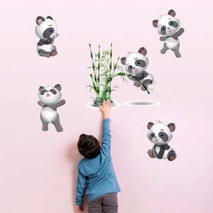 Detail of cute panda and bamboo wall decals displayed in a pink children room setting