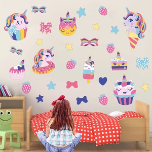 Cute cartoon unicorn wall decals with dessert elements in a cozy child's bedroom setting