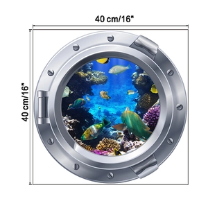 Sticker mural 3D hublot avec poissons tropicaux et récif corallien, rond 40cm