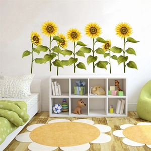Detail of vibrant yellow sunflower wall stickers applied to a children's room wall