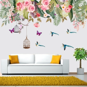 Floral wall sticker with roses, hummingbirds and birds in a modern living room