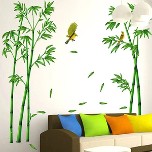 Detail of green bamboo wall sticker with birds in a modern living room setting
