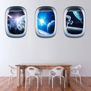Three-piece 3D space porthole wall decals showing Earth and astronaut on white wall