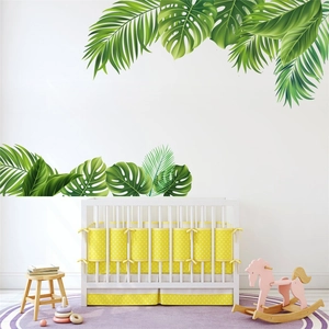 Tropical monstera and palm leaf wall decals set for a cozy nursery or bedroom decor