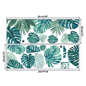 Detailed view of two tropical monstera leaf wall stickers set measuring 90x30cm each