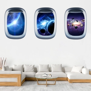 Three-piece window view wall stickers featuring 3D galaxies and planets over a sofa