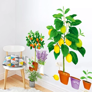 Realistic lemon and orange tree wall stickers with gardening tools in a home setting