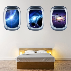Three-piece spaceship window wall decals featuring Earth, blue nebula, and planets in a bedroom