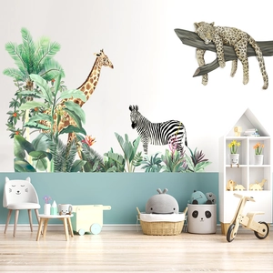 Jungle animal wall decals with giraffe, zebra, and leopard in a cozy kids nursery room