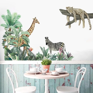 Detail of wild animals wall decals with giraffe and zebra in a cozy dining room scene