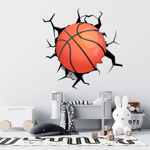 Detail view of 3D basketball wall decal with realistic cracks in a cozy nursery setting