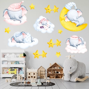 Detail of elephant, moon and stars wall decals for a cozy nursery or kid room decor