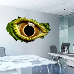 Detailed 3D wall sticker featuring a realistic dinosaur eye on a modern office wall
