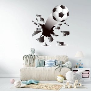 Detailed view of 3D football wall decal showing broken wall effect in kids bedroom