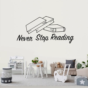 Close-up of Never Stop Reading wall decal with artistic book stack illustration