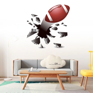 3D cracked wall decal featuring an American football in a modern living room setting