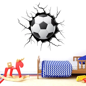 Detailed view of 3D football wall decal showing realistic wall cracking effect on a white surface