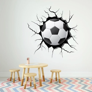 3D football wall decal showing realistic wall crack effect in a modern kids bedroom