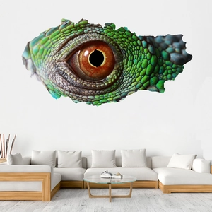 Detail of 3D cracked wall sticker with a green scaly reptile eye over a white sofa
