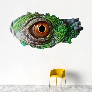 Detail of 3D cracked wall sticker showing a realistic green reptile eye with yellow chair