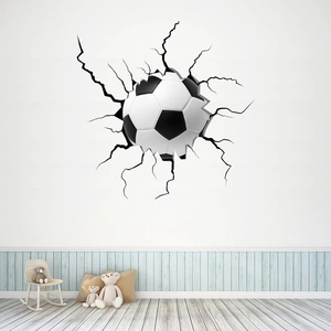Detailed view of 3D football wall decal showing realistic wall crack effect in kids room