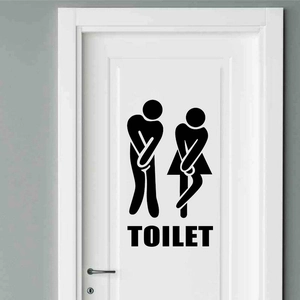 Creative toilet wall sticker with black silhouette figures on a white modern door