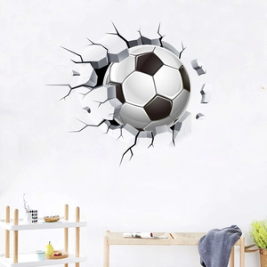 3D football breaking through wall decal with realistic black cracks and stone fragments