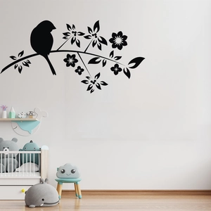 Elegant black vinyl bird and floral tree branch wall decal for cozy bedroom decor