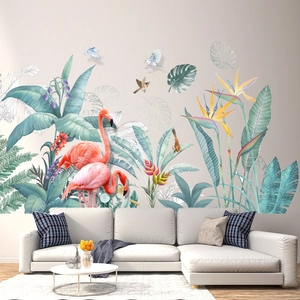 Tropical wall sticker with pink flamingos and green monstera leaves for home decor