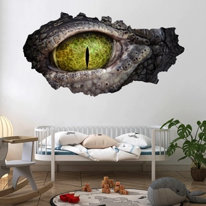 Detailed 3D dinosaur eye wall sticker with broken wall effect in a children's bedroom