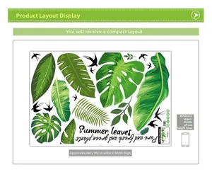 Detail of tropical plant wall stickers with monstera leaves and black bird silhouettes